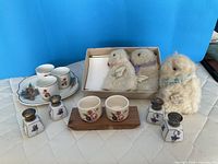 Group shot showing all egg holders, salt shakers and egg cosies