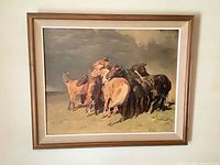 Framed reproduction print on wall