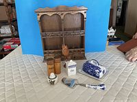 Group shot of all items including spice rack, ceramics, wooden pieces