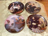 Front view of all four Rockwell Heritage plates