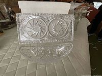 Rectangular pinwheel cut crystal tray and boat dish displayed together