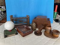 Group shot of all seven tobacciana items