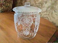 Full view of glass biscuit jar with lid
