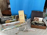 All three appliances with boxes and attachments visible