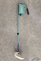 Full view of Compass Magnum 220 metal detector showing shaft, grip, control housing and search coil