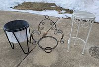 Group view of all three metal plant accessories on driveway