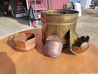 All four brass and copper pieces group shot