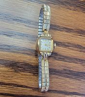 Front view of Bulova M3 wristwatch showing dial and expansion bracelet