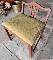 Three-quarter view of Drexel mahogany side chair showing frame and upholstery