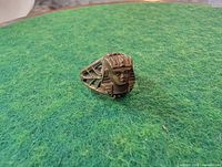 Front view showing Pharaoh head detail on ring