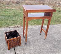 Bookstand and wastebasket full view outdoors