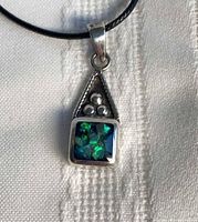 front view of sterling silver pendant on cord