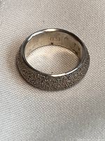 Interior view showing 925 stamp and texture