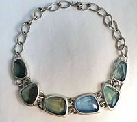 Full view of choker showing glass stones and chain links