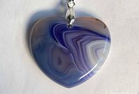 Front view of heart-shaped banded agate pendant