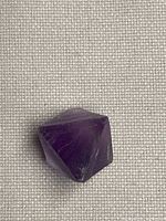 Top view of fluorite octahedron showing color and face clarity