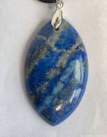 front view of polished marquise lapis lazuli pendant