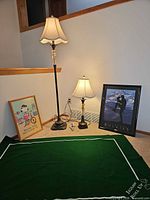 Overall lot showing both lamps, two framed prints, puzzle mat and bulbs