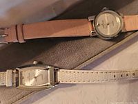Two Anne Klein watches with leather straps
