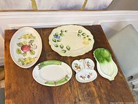 Group shot of all five ceramic platters on table