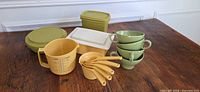 Full lot overview showing measuring cups, pitcher, storage containers and melamine cups