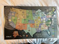 Full view of map holder with quarters inserted