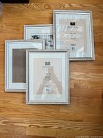 Four silver Intercraft Directions frames front view