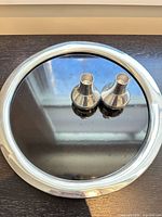 Platter with both candlesticks resting on center