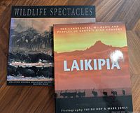 Front covers of both wildlife photography books visible