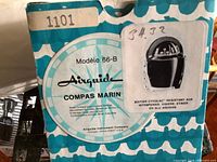 Front of Airguide compass box showing model information