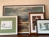 All four framed artworks grouped