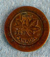 Obverse showing maple-leaf design, date and altered rim