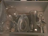 Bin containing oval tray, two bowls, bud vase and candlesticks