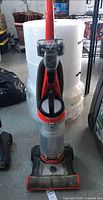 Front view of Bissell CleanView upright vacuum showing clear canister and base