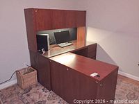 Front view showing L-shaped desk, hutch, pedestal drawers