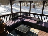 full view of sectional setup with coffee table on deck