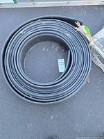 Coiled black resin edging