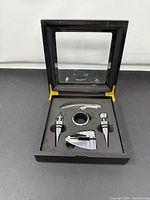 Open display box showing all five tools in foam insert