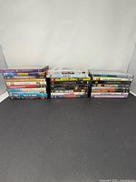 Full view of two stacks totaling 27 DVD cases