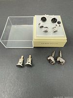 Boxed Perry Ellis Portfolio cufflink and stud set with two loose cufflink pairs