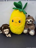 All three plush toys together