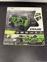 Front of sealed box showing vehicle image and specs (17 mph, 2.4 GHz, RWD, RTR)