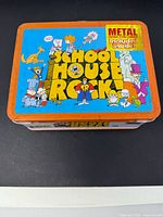Closed Schoolhouse Rock metal lunchbox lid view
