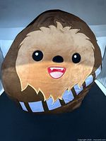 Front view of Chewbacca Squishmallows plush showing embroidered face and bandolier