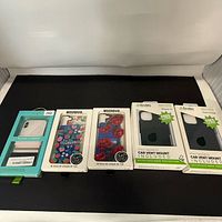 Front view of all five boxed phone cases
