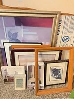 Overview of assorted frames, prints, anti-glare glass