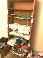 Front view showing full height bookcase with shelves