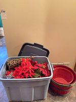 Tote with lid, poinsettias visible, two red-green baskets beside
