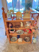 Overall view of shelving with all decor items