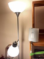 Floor lamp lit showing torchiere and gooseneck lights